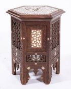 A near eastern carved hardwood and bone parquetry occasional table, probably Egyptian, circa 1900,
