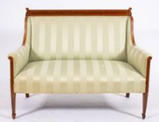 An Edwardian mahogany, crossbanded and upholstered marquise sofa, early 20th century,