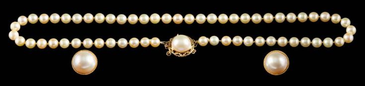 A cultured pearl necklace,: composed of uniform 7mm cultured pearls, on a knotted string,