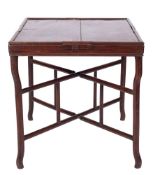 A Chinese huanghuali games table and stand: the square tray top with a gaming-piece drawer to each