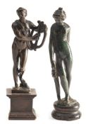 A Grand Tour bronze figure, Apollo with a lyre: mounted on a square polished wood base,