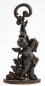 A Victorian cast iron door stop,
