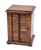 An Victorian burr walnut table top Wellington chest, circa 1860,: the caddy top with moulded edges,