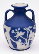 A Wedgwood blue and white jasper ware 'Portland' vase: decorated in low relief with the myth of