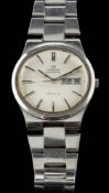 Omega, Geneve, a stainless steel wristwatch,: the silvered dial with black baton numerals,