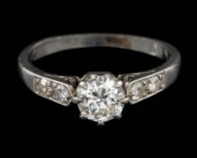 A diamond ring,: the brilliant cut diamond, estimated to weigh 0.