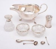 A George VI silver sauceboat, maker Mappin & Webb, Sheffield, 1938: with wavy edge border,