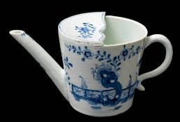 A Lowestoft blue and white feeding cup: painted to each side with flowering branches and a