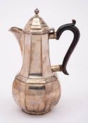 A Victorian silver coffee pot, maker George Aldwinckle, London 1894: of octagonal baluster form,