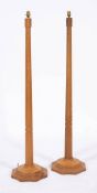 Workshop of Robert 'Mouseman' Thompson (Kilburn), a pair of English oak standard lamps,