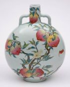 A Chinese famille rose 'peaches' moon flask: painted with bats flying amongst peach branches and