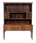 A George III oak dresser, late 18th century and later elements,