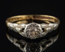 A diamond single stone ring,: set with an old cut diamond, stamped 18ct & plat, ring size N.