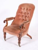 A George IV mahogany and button upholstered library armchair, circa 1825,