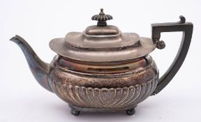 A Victorian silver teapot, maker Walter & John Barnard, London, 1894: of barge-shaped outline,