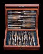 A matched set of George III and later fruit knives and forks,