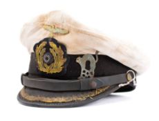 A WWII Kriegsmarine U-Boat Officer's peaked cap: the white cloth cover with gilt brass eagle and
