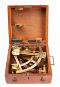 An early 20th century lacquered brass 8 inch radius vernier sextant by Stanley,