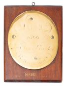 A Victorian oval brass boat nameplate 'Mabel': with faint traces of name and date '1866' and