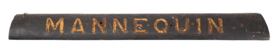 The wooden sternboard name from the Brixham Trawler BN18 'Mannequin':,