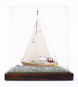 A small scale model of a GK 24 yacht 'Tern' No K370: fully rugged with crew on deck,