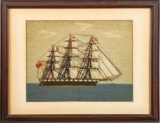 Am early 20th century woolwork of an unnamed merchant ship: fully rigged over black hull,