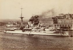A framed photograph of HMS 'Warspite' and another of HMS/m 'Alaric': 16x22.5cm and 16.5x27.