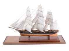 A scale model of the Cutty Sark: running rigged over detailed decks with wheel house and lifeboats