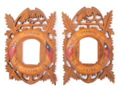 A pair of early 20th century wooden nautical picture frames: each in the form of a life preserver