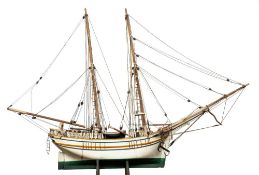 A scale model of a Baltic trader: running rigged over deck with wheelhouse, winch and fitting,
