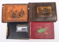 A group of three photograph albums of Royal Navy ships in service: each with images of various