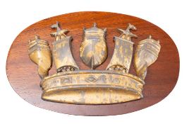 A late 19th/early 20th century gilt lead Admiralty crown tompion,