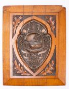 An oak and copper plaque constructed from material of HMS Foudroyant: the central copper repousse