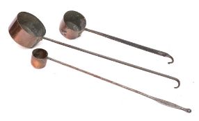 A copper and iron handled dipper: with 12cm diameter bowl,