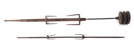 A 19th Century jack driven steel spit:, 107cm long and a smaller metal spit, 87cm long.
