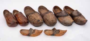 Four pairs of Pyrenean wooden wedding clogs: of varying styles.
