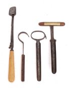 Two 19th Century iron cheese corers:, also a bone-handled stilton scoop and a butter curler.