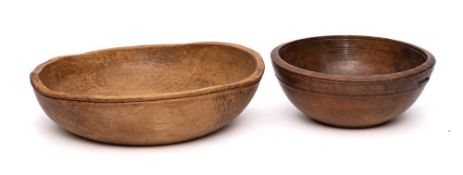 A 19th Century fruitwood circular bowl: with incised band, 31cm diameter,