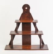 A 19th Century fruitwood three tier graduated spice shelf: with rectangular tops, 48cm high.