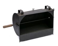 A 19th Century tin hastener: with interior handled driven spit and door to the reverse, 52cm wide.