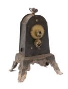 A 19th Century Continental clockwork spit engine: in domed blackened metal casing on a cast iron