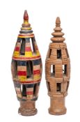 A polychrome decorated wood subre joug: of oviform shape, having three tiers each with a bell,