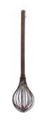 A large 19th Century wirework whisk: with wood handle, 82cm long.
