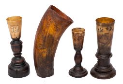 A 19th Century horn stem cup: bearing initials T.S., on turned wood base, 20.