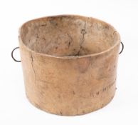 A rare West Country wooden dug out bucket: with iron loop twin handles, 39cm diameter,