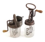A glass and metal mounted family butter churn: with slice cut bowl,