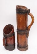 A Pyrenean Cresse belle iron coopered jug:, 56cm high and a smaller jug or scoop, 31.5cm high.