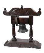 A Continental bell: on an oak portico stand,