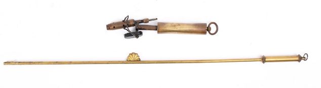 A brass telescopic taper holder: with anthemion slide and ring terminal,