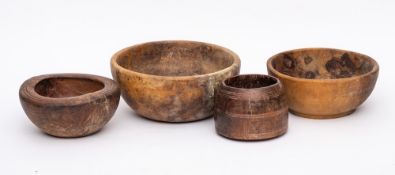 Four various turned wood circular bowls:, 26.5cm, 23cm, 19.5cm and 14.5cm diameter.
